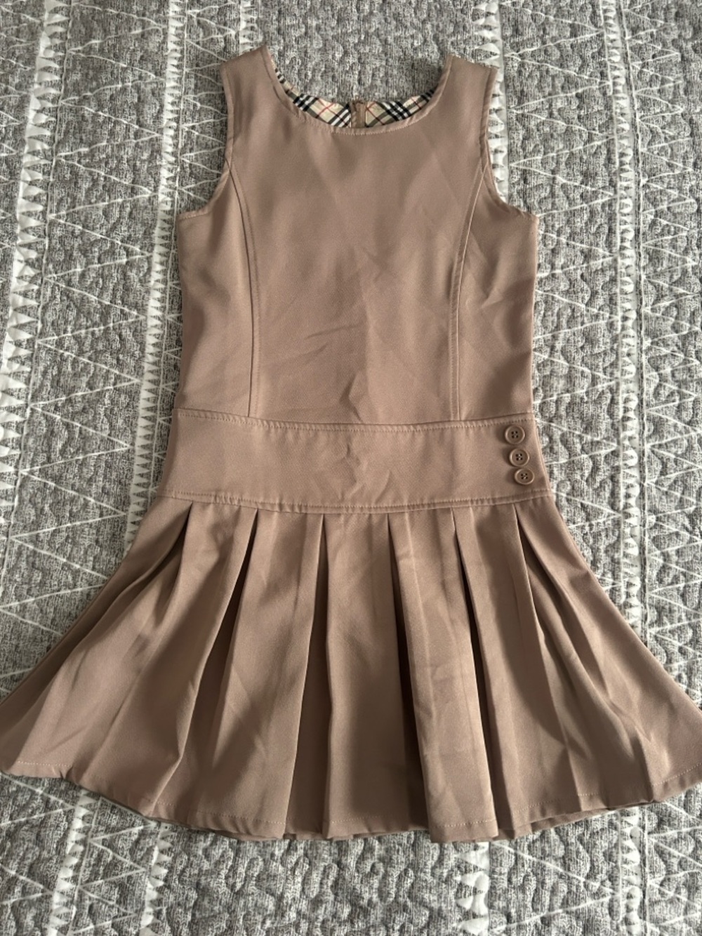 Sleeveless Pleated Girls School Uniform Dress in Tan with Button Waist Detail